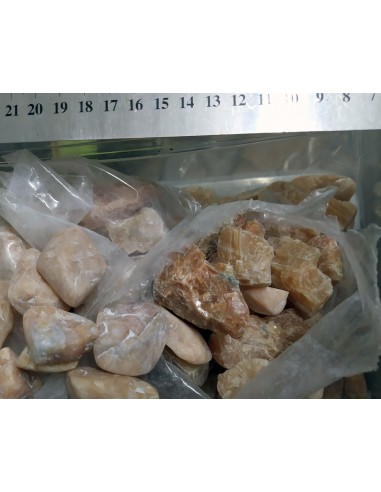 calcite de feu brut et polie © La Bijouterie Minerale