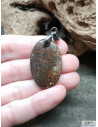 Pendentif en Os de dinosaure fossile de 32 * 20.4 mm forme ovale de La Bijouterie Minerale